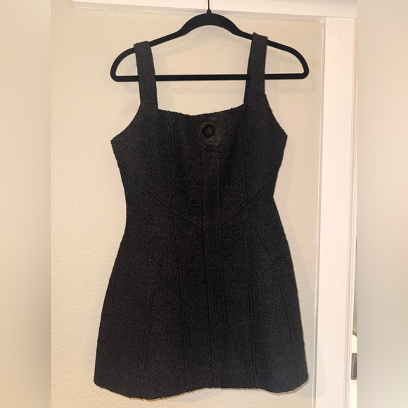 Chic Black Mini Dress with Floral Accent - Picture 2 of 5